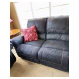 Two-Piece Living Room Set Featuring Loveseat with Center Console and Matching Three-Seat Sofa in Leather Two-Piece Living Room Set Featuring Loveseat with Center Console and Matching Three-Seat Sofa in Leather