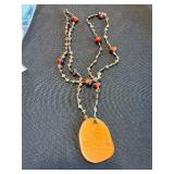 Necklace - Oval Wooden Pendant Beaded with Red Accent Beads