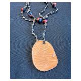 Necklace - Oval Wooden Pendant Beaded with Red Accent Beads