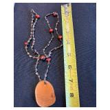 Necklace - Oval Wooden Pendant Beaded with Red Accent Beads
