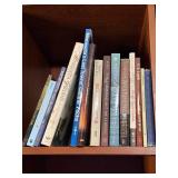 Books - Assorted Paperback & Hardcover Collection on Wood Shelf Books - Assorted Paperback & Hardcover Collection on Wood Shelf