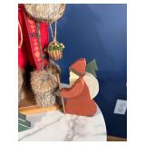 Santa Claus Figurine Display with Wooden Christmas Cutouts Santa Claus Figurine Display with Wooden Christmas Cutouts