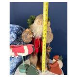 Santa Claus Figurine Display with Wooden Christmas Cutouts Santa Claus Figurine Display with Wooden Christmas Cutouts