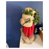 Santa Claus Figurine Display with Wooden Christmas Cutouts Santa Claus Figurine Display with Wooden Christmas Cutouts