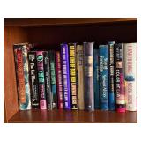 Books - Assorted Mystery & Thriller Collection on Wood Shelf Books - Assorted Mystery & Thriller Collection on Wood Shelf