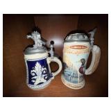 Pair of Lidded Ceramic Beer Steins Eagle Finial & Sporting Breeds