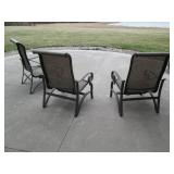 3 Rocking metal frame patio chairs...
