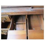 Antique rolltop desk with lots of s...