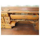 Antique rolltop desk with lots of s...