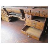 Antique rolltop desk with lots of s...