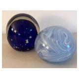 UL - Two Blue Glass Paperweights
