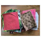 2 6-Inch-High Piles of Quilting Squares