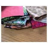 2 6-Inch-High Piles of Quilting Squares