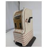 Vintage U.S. Postage Stamp Dispenser - The Northwestern Corporation