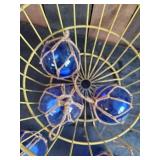 5 Mini Buoys with tea lights and an Antique Egg Basket