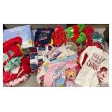 Bin of holiday, sleepwear, socks, and accessories