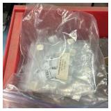 miscellaneous bin of Velcro embroidery thread zippers patches