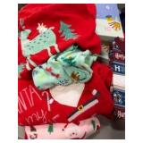 Bin of holiday, sleepwear, socks, and accessories