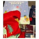 Bin of holiday, sleepwear, socks, and accessories