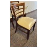 (4) padded wooden chairs