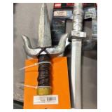 Bucket of Halloween costume swords