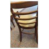 (4) padded wooden chairs