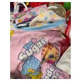 Bin of holiday, sleepwear, socks, and accessories