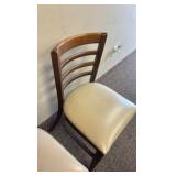 (4) padded wooden chairs