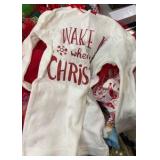 Bin of holiday, sleepwear, socks, and accessories