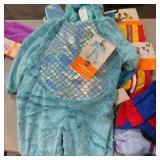 bin of Halloween costumes