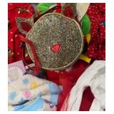 Bin of holiday, sleepwear, socks, and accessories