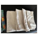 Table Linens Lot - 13 Straw Placemats, 11 Black/Gray Placemats, 8 Red Linen Striped Placemats, 4 Tablecloths