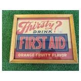 Thirsty? Drink First Aid Framed Ad