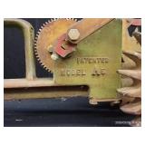 VINTAGE NATIONAL WALKING LAWN SPRINKLER AND WHEELS