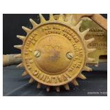 VINTAGE NATIONAL WALKING LAWN SPRINKLER AND WHEELS
