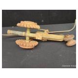 VINTAGE NATIONAL WALKING LAWN SPRINKLER AND WHEELS