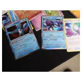 LOT OF POKEMON TRADING CARDS