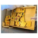 Two Kubota L5030 Toy Tractors with Disney Plush Toys & Wooden Blocks in Sterilite Tote