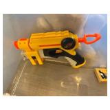 Two Kubota L5030 Toy Tractors with Disney Plush Toys & Wooden Blocks in Sterilite Tote