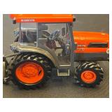 Two Kubota L5030 Toy Tractors with Disney Plush Toys & Wooden Blocks in Sterilite Tote