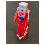 Two Kubota L5030 Toy Tractors with Disney Plush Toys & Wooden Blocks in Sterilite Tote