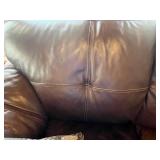 Brown Leather Sofa - 3-Seater with Floral Throw Pillows