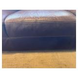 Brown Leather Sofa - 3-Seater with Floral Throw Pillows