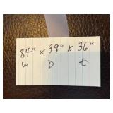 Brown Leather Sofa - 3-Seater with Floral Throw Pillows