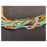 Hanging Jewelry Organizer with Clear Pockets - Includes 3 Beaded Necklaces