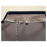 Coordinating Silver-Tone Filigree Necklace Set with Teardrop Earrings and Pendant