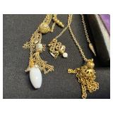 Assorted Lariat Necklaces - Gold tone & Silver-Tone Fashion Jewelry in Display Case