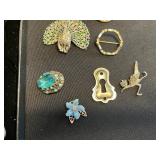 Vintage Stamp Pendant Necklaces & Rhinestone Brooches in Display Case - brooches missing stones or pins