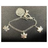 Vintage Jewelry Assortment: Maple-Leaf Charm Bracelet, Heart Locket, Engraved Bar & Hair Comb - quarter for scale