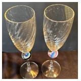 K - Two Signed Art Glass Champagne Flutes